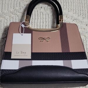 Elegant Black and Brown Satchel with Gold Details